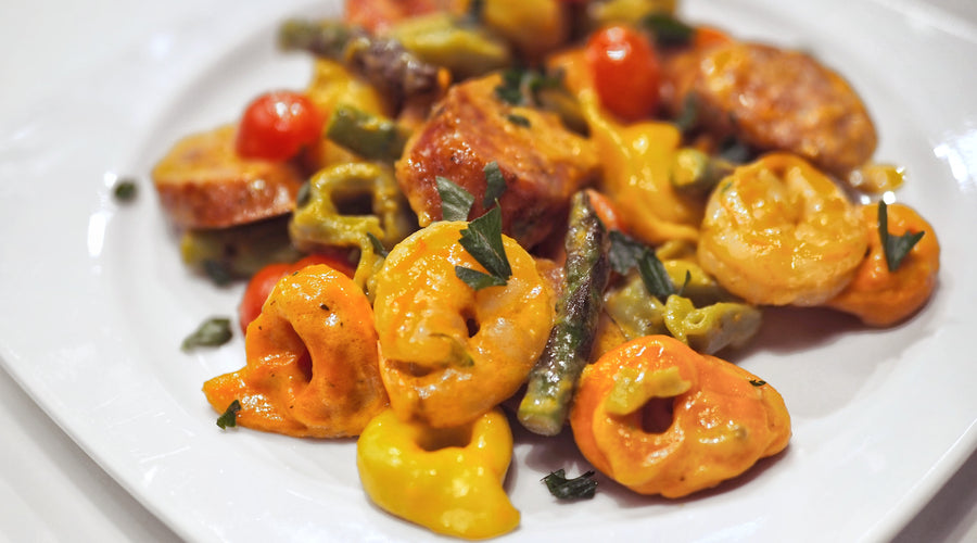 Tri-Color Tortellini with Shrimp & Andouille Sausage in Tomato Basil Cream Sauce