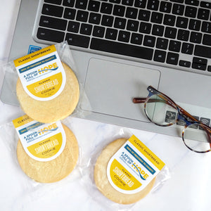 A Spoon Full of Hope Classic Shortbread Cookie with computer and glasses